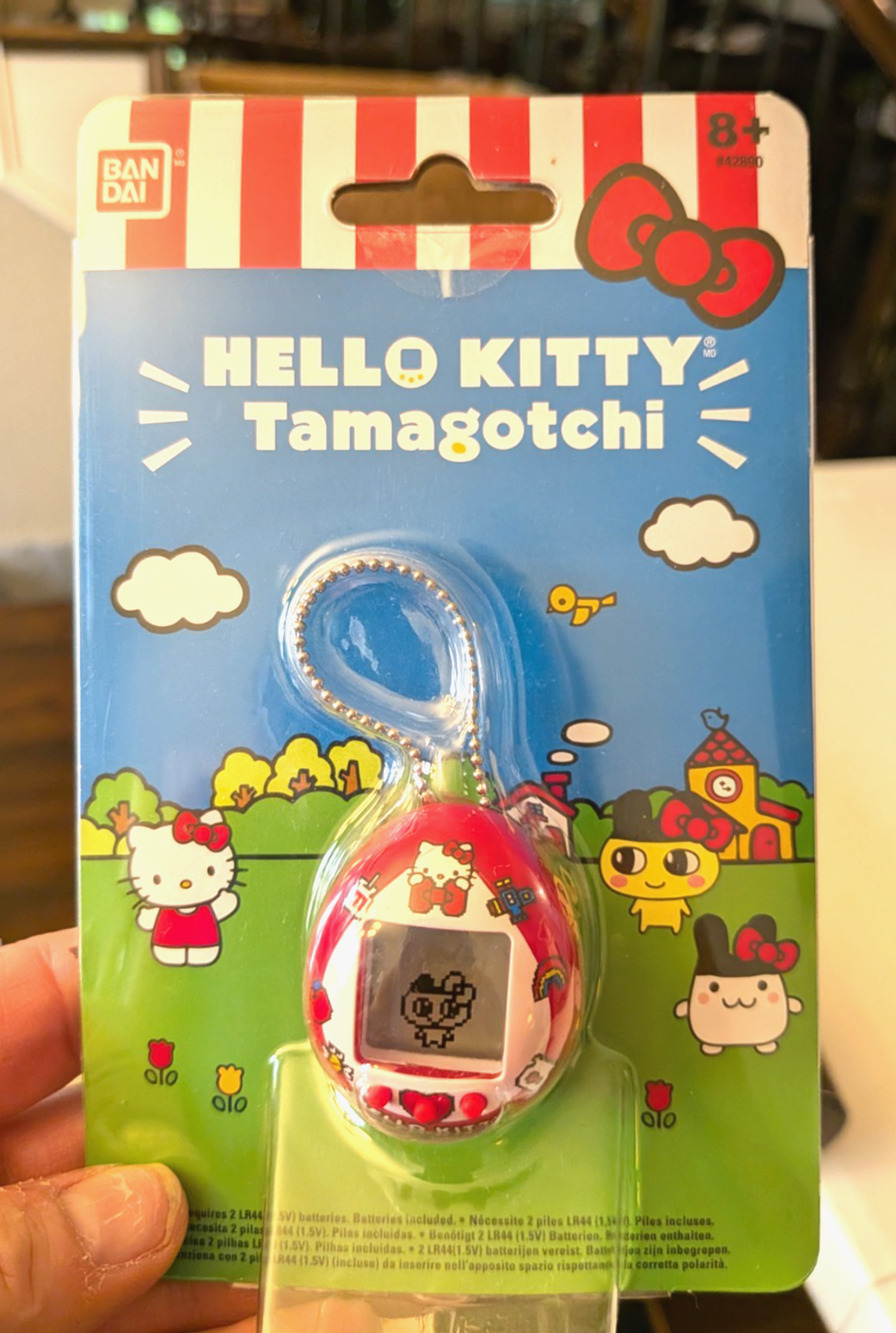Hello Kitty Tamagotchi Virtual Pet Bandai Electronic Game New Sealed Apple Shell